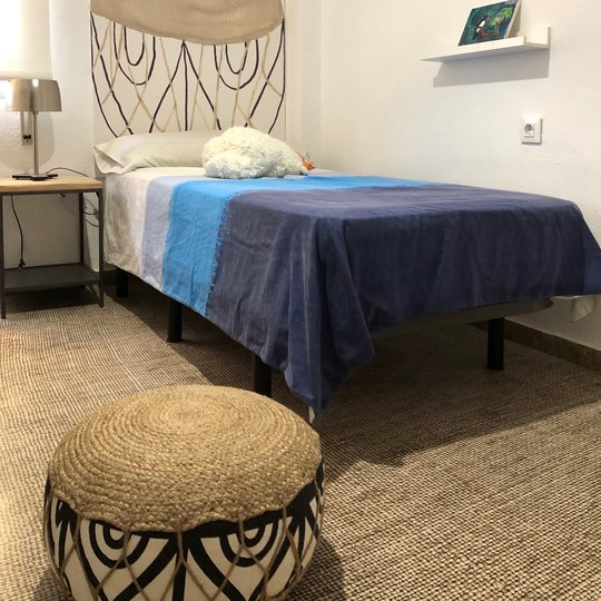 Dormitorio con textura con diseño Ana Durán